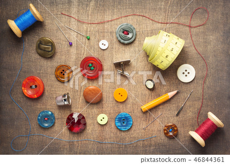 tailor or sewing accessories and supplies with tools at wooden table Stock  Photo by seregam