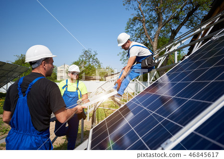 Stand-alone exterior solar panel system installation, renewable green energy generation concept. Stand-alone exterior solar panel system installation, renewable green energy generation concept. 46845617
