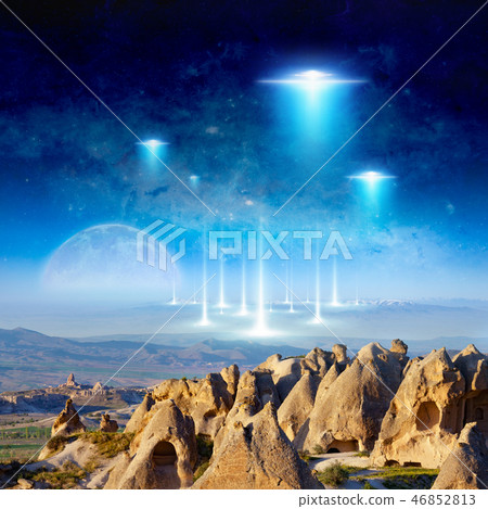 Aliens spaceship fly above surreal terrain 46852813