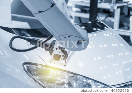 The CMM laser probe attach on the robotic arm . The CMM laser probe attach on the robotic arm . 46852956