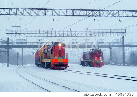 shunting diesel locomotives during snowfall 46854356