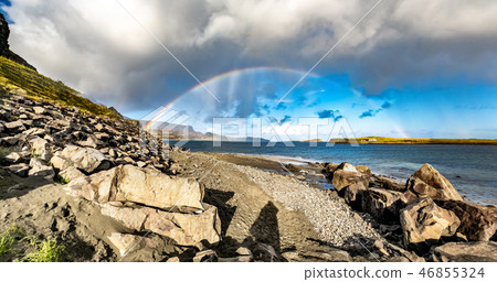 Rainbow above the famous Dinosaur bay at Staffin on the isle of Skye. 46855324