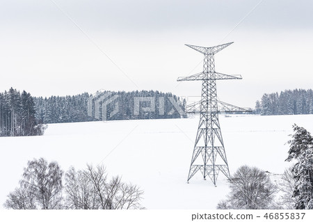Construction of high voltage pylons in winter. Construction of high voltage pylons in winter. 46855837