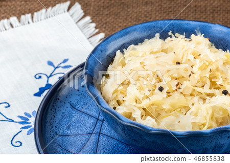Sauerkraut in a blue bowl. Sauerkraut in a blue bowl. 46855838