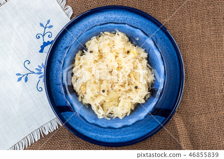 Sauerkraut in a blue bowl. Sauerkraut in a blue bowl. 46855839