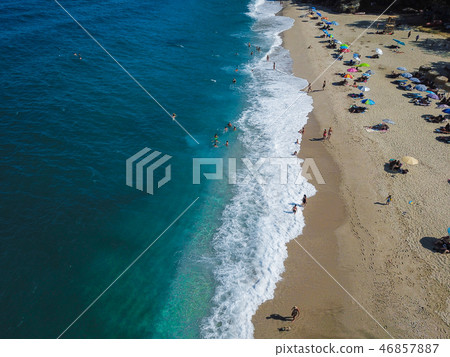 Beach with sun loungers on the coast of the ocean 46857887
