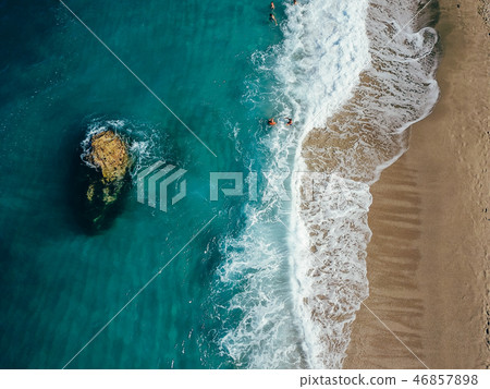 Aerial View From Flying Drone Of People Relaxing Aerial View From Flying Drone Of People Relaxing 46857898