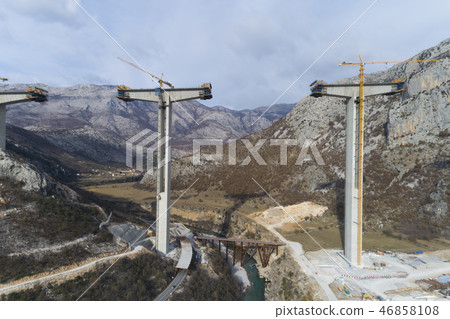 Construction of bridge of a new highway through the Moraca canyon in Montenegro 46858108