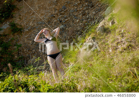 Young sexy blonde woman in bikini Young sexy blonde woman in bikini 46858800