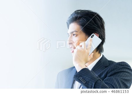 Male employee who calls a young businessman Male employee who calls a young businessman 46861153