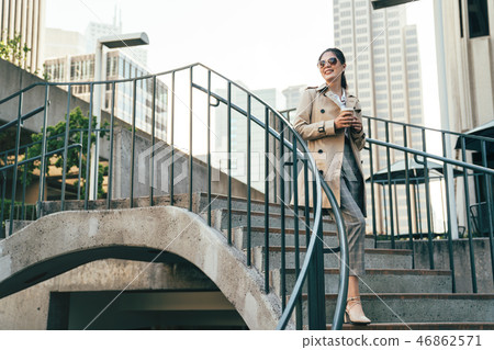 college girl student going down the stairs 46862571