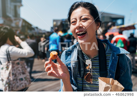 happy woman tasty street food in san francisco happy woman tasty street food in san francisco 46862998