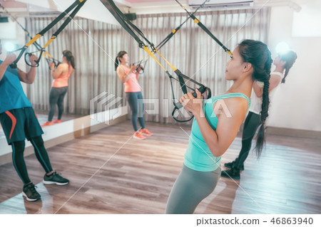 students in gym training arms stronger chest 46863940