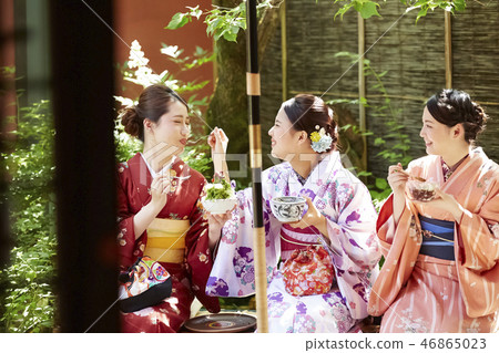 Three women in kimono wearing sweetness in a teahouse 46865023