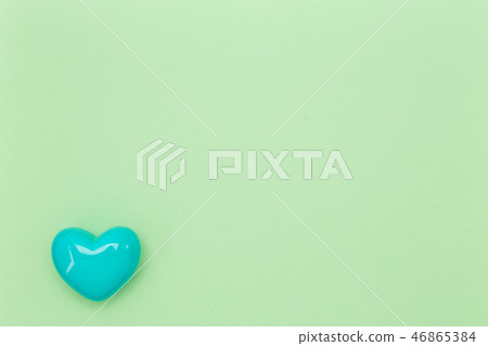 Blue heart shape on the green pastel Blue heart shape on the green pastel 46865384