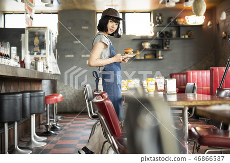 A woman working in a cafe 46866587