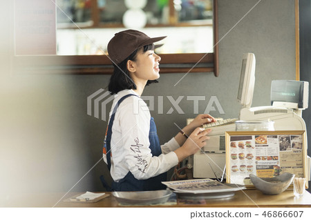 A woman working in a cafe 46866607