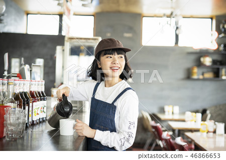 A woman working in a cafe 46866653