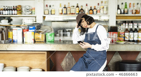 Woman working in cafe 46866663