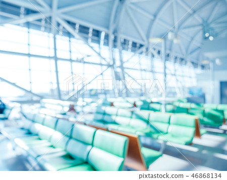 Abstract blur and defocused airport terminal interior Abstract blur and defocused airport terminal interior 46868134