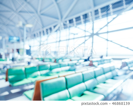 Abstract blur and defocused airport terminal interior Abstract blur and defocused airport terminal interior 46868139