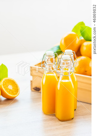 Fresh orange juice for drink in bottle glass Fresh orange juice for drink in bottle glass 46869832
