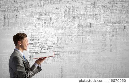 Businessman with opened book Businessman with opened book 46870960