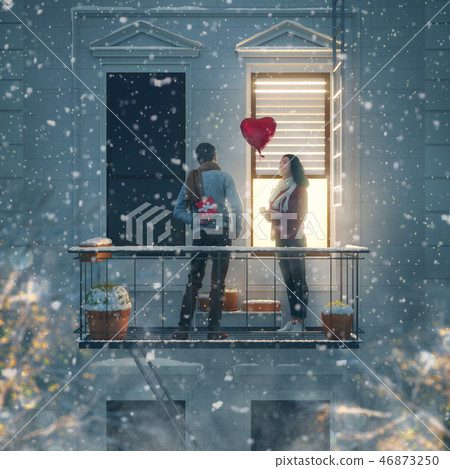 couple on balcony on Valentine's day 46873250