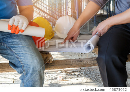 Engineer discuss with foreman in construction site Engineer discuss with foreman in construction site 46875032