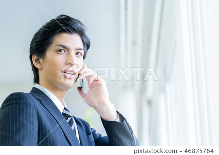 Male employee who calls a young businessman 46875764