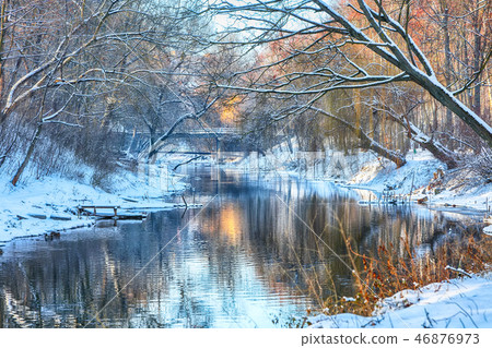 Scenic view of the river and trees in winter 46876973