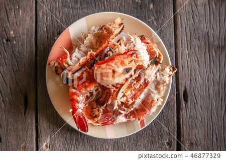 Food waste shrimp shell in plate on old wood table 46877329