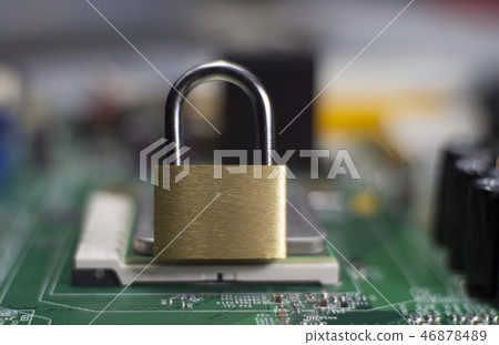 Closed lock on a computer mainboard chip Closed lock on a computer mainboard chip 46878489