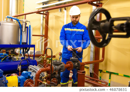 Engineer maintenance works on oil factory Engineer maintenance works on oil factory 46878631