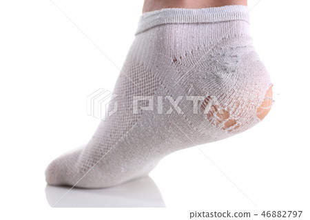 Ripped white sock on male leg isolated 46882797