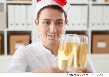 A group of businesspeople celebrating Christmas 46882993