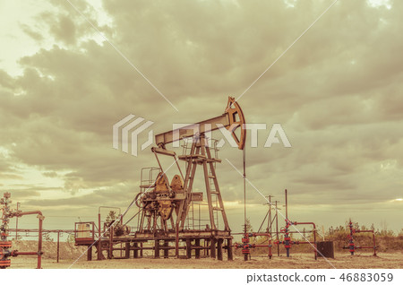 Pump jack. Extraction of oil. Petroleum concept. 46883059