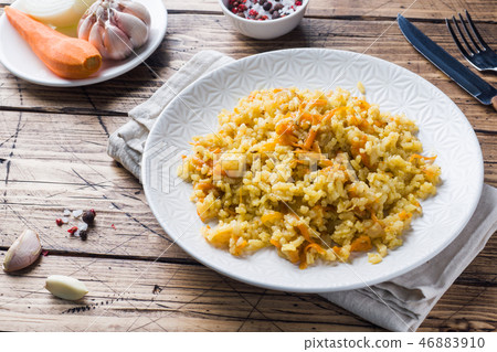 Vegetarian Oriental pilaf with rice and vegetables Vegetarian Oriental pilaf with rice and vegetables 46883910