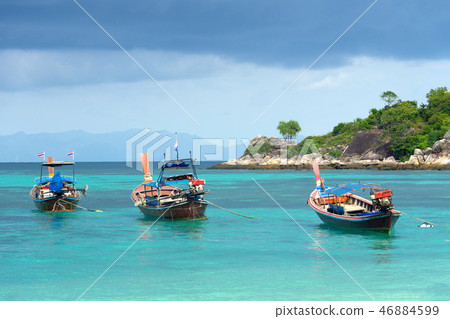 Long-tailed boat on Sunrise Beach 46884599