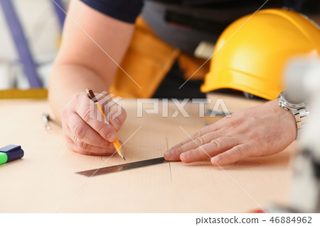 Arms of worker making structure plan Arms of worker making structure plan 46884962