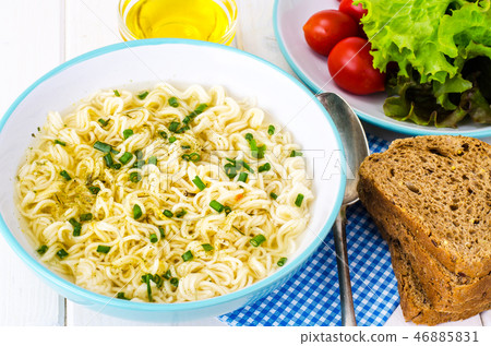 Soup with instant noodles Soup with instant noodles 46885831