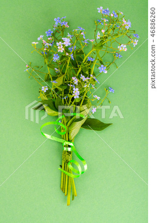 Small bouquet with blue flowers 46886260