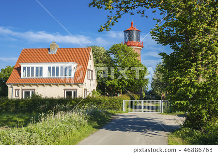 Lighthouse at the steep coast Staberhuk 46886763
