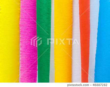 Colored paper strips decorate on board Colored paper strips decorate on board 46887282