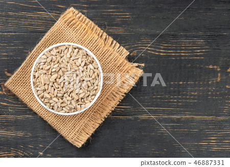 Sunflower seeds in bowl 46887331