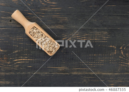 Sunflower seeds in scoop Sunflower seeds in scoop 46887335