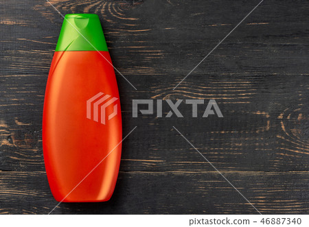 Orange shampoo bottle Orange shampoo bottle 46887340