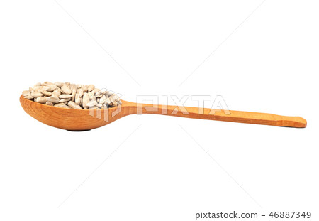 Sunflower seeds in spoon Sunflower seeds in spoon 46887349