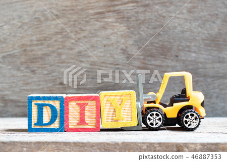 Toy forklift hold letter block Y to word DIY 46887353