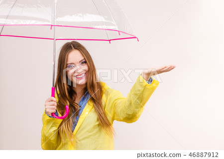 Woman in rainproof coat with umbrella. Forecasting Woman in rainproof coat with umbrella. Forecasting 46887912